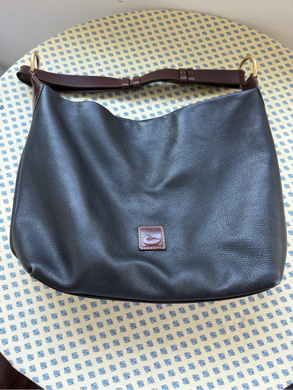 Dooney & Bourke Black Leather Handbag with Brown Leather Strap